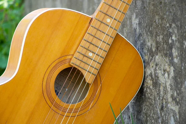 Wooden Brown Guitar Lies Stone Road Street Spring Grass — Stock Photo, Image