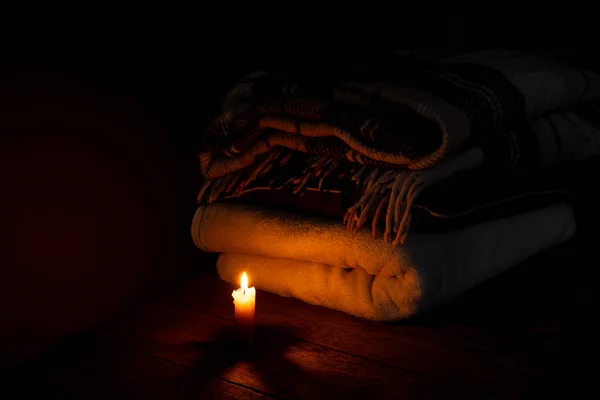 Blanket Pillow Folded Stack Background Fire Candles Dark Bedroom — Stock Photo, Image