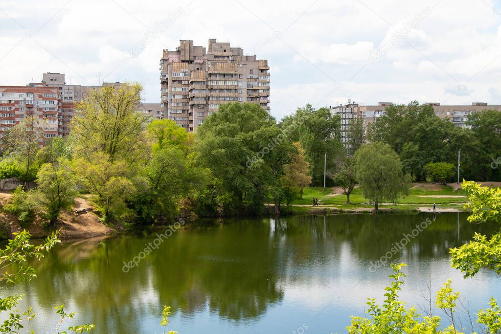 multi-storey building on the background of a quarry in the red stone housing estate in the cities of in Ukraine