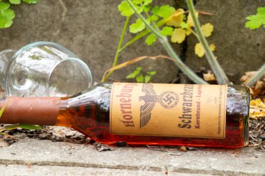 Ukraine, Dnipro - April 06, 2020. horneburger 1939 whiskey of the third reich found in the cellar lies street clipart