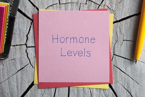 Hormone  Levels written on a note