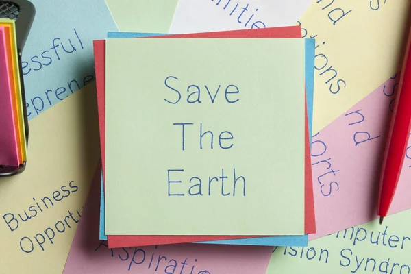 Save The Earth written on a note