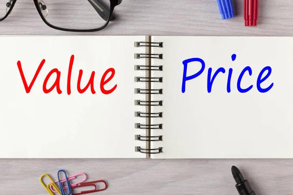 Value and Price written on notebook — Stock Photo, Image