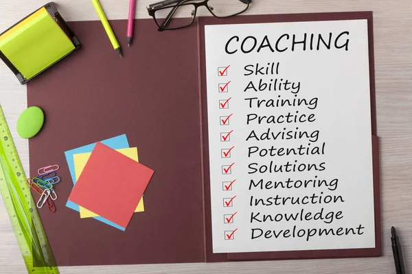 Coaching escrito en hoja en concepto de carpeta — Foto de Stock