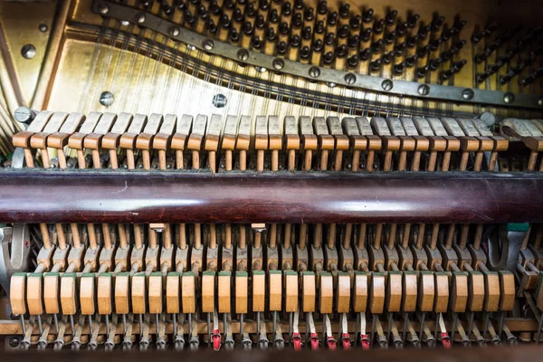 Inside view of old upright piano — 스톡 사진