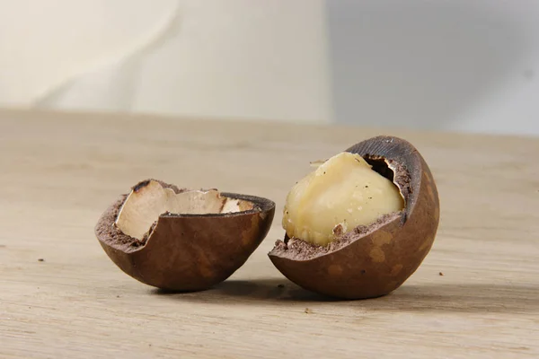Macadamia Nuts Oak Table — Stock Photo, Image