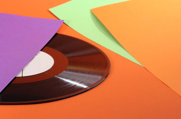 Vinyl disc on an orange background