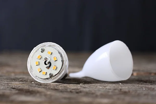 Components Led Light Bulb Dark Table — 스톡 사진