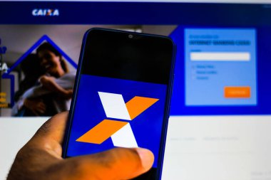 24 Aralık 2019, Brezilya. Bu resimde, Caixa the-ômica Federal uygulama logosu bir akıllı telefonda gösteriliyor.