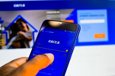 24 Aralık 2019, Brezilya. Bu resimde, Caixa the-ômica Federal uygulama logosu bir akıllı telefonda gösteriliyor.