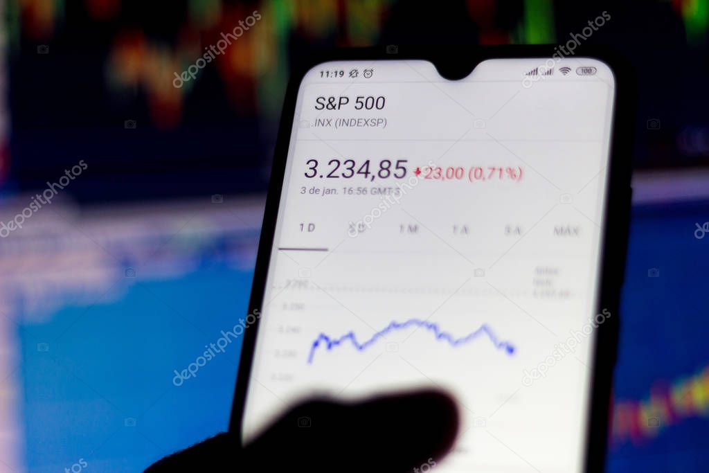 In this photo illustration the stock market data of the SP 500 is viewed on a smartphone.