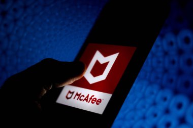 February 24, 2020, Brazil. In this photo illustration a McAfee logo seen displayed on a smartphone. clipart