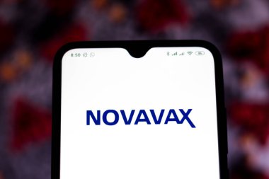 March 31, 2020, Brazil. In this photo illustration Novavax logo is seen displayed on a smartphone. clipart