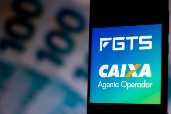 April 3, 2020, Brazil. In this photo illustration a Fundo de Garantia do Tempo de Servico (FGTS) logo seen displayed on a smartphone.