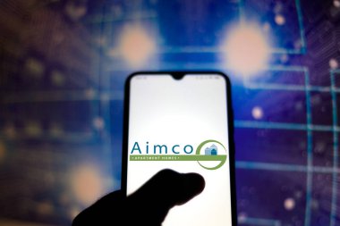 May 10, 2020, Brazil. In this photo illustration the Apartment Investment and Management Company (AIMCO) logo seen displayed on a smartphone. clipart
