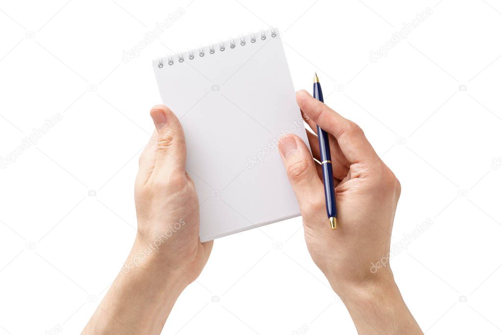 Male hands holding an open empty notebook and a pen. Isolated.