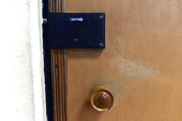 Internal lock in the office room with a latch