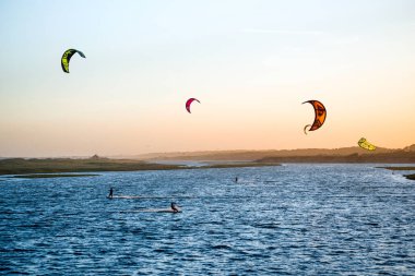 Jose Ignacio, Uruguay: Kiters on the Garzon Bay are using last s clipart