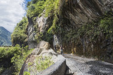 Cascades route, Banos - Puyo, Ecuador - December 8, 2017: Touris clipart