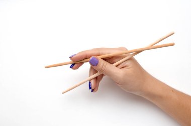 An example of how to hold sticks