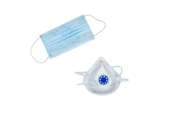 Isolated medical face protection masks against pollution, virus, flu and Covid-19, bacteria, coronavirus on a white background. Construction respiratory device against dust with valve.