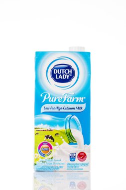 KUALA LUMPUR,MALAYSIA - FEBRUARY 16,2020 : A pack of Dutch Lady Pure Farm low fat UHT milk on white background.