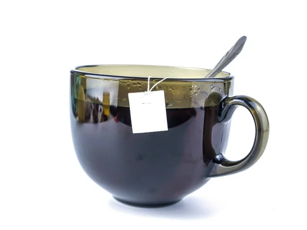 Beyaz arka planda bir fincan çay ve metin için boş yer.. — Stok fotoğraf