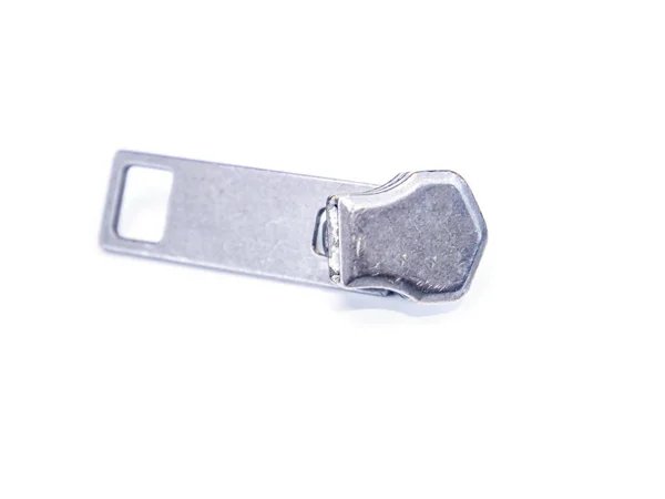 Zipper deslizante em um fundo branco . — Fotografia de Stock