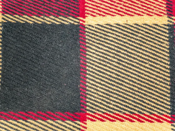 Texture of colored checkered woolen fabric. — Stock Photo, Image