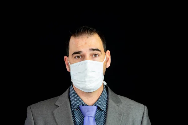 Young Man Suit Mask Prevent Coronavirus Posing Black Background — Stock Photo, Image