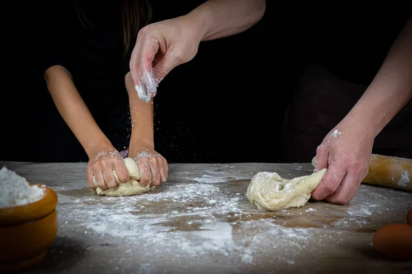 Hands Man Girl Kneading Bread Dough Wooden Table Black Background — Stock Photo, Image