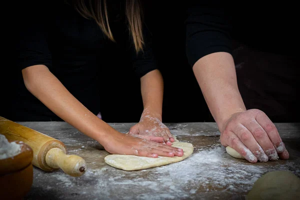 Hands Man Girl Kneading Bread Dough Wooden Table Black Background — Stock Photo, Image