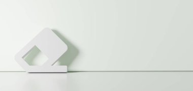 Silgi simgesinin 3d görüntülemesi sağ tarafında boş alan olan zemin yansıması ile renk duvarına yaslanıyor