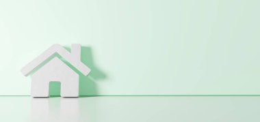 Ev simgesinin 3d görüntülemesi sağ tarafında boş alan olan zemin yansıması ile renk duvarına yaslanıyor