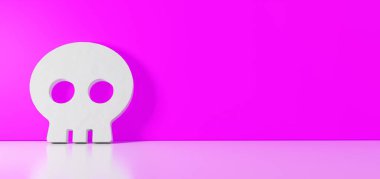 Kafatası simgesinin 3d görüntülemesi sağ tarafında boş alan olan zemin yansıması ile renk duvarına yaslanıyor