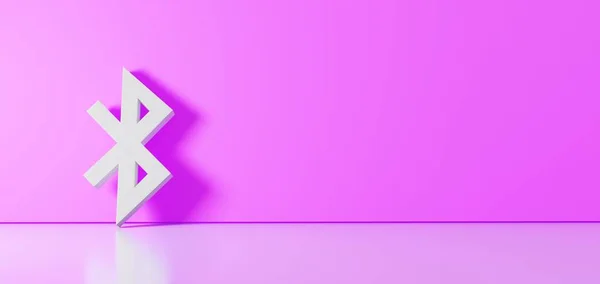 Representación 3D del símbolo blanco del icono Bluetooth apoyado en la pared de color con reflejo del suelo con espacio vacío en el lado derecho — Foto de Stock