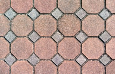 Caddenin dibindeki asfalt döşeme dokusu. Beton tuğla kare taş zemin. Beton döşeme levhaları. Paving levhaları