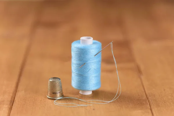 White Blue Cotton Thread Bobbin Needle Close — 스톡 사진