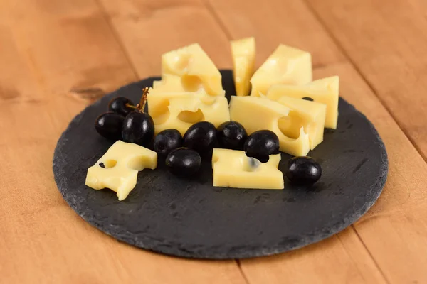 Cheese End Black Grapes Slate Plate Wooden Table — Stock Photo, Image