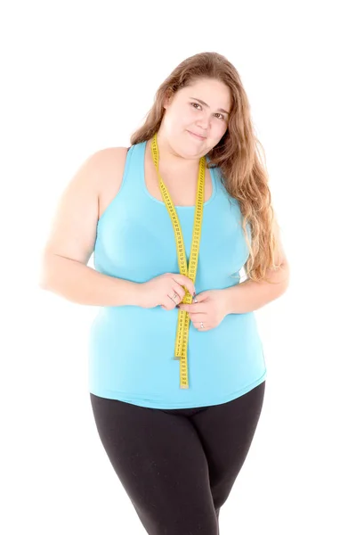 Overgewicht meisje met maatregel — Stockfoto