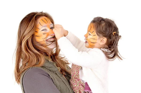 Hermanas con la cara pintada — Foto de Stock