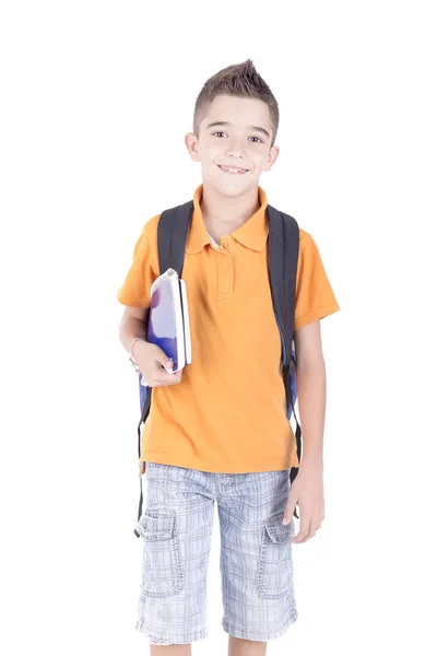 Niño sosteniendo libros — Foto de Stock