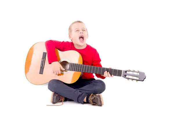 Malý chlapec s kytarou — Stock fotografie