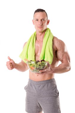 kaslı adam taze salata ile uygun 