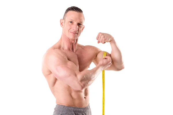 Fit muskulöser Mann mit Zentimeter — Stockfoto