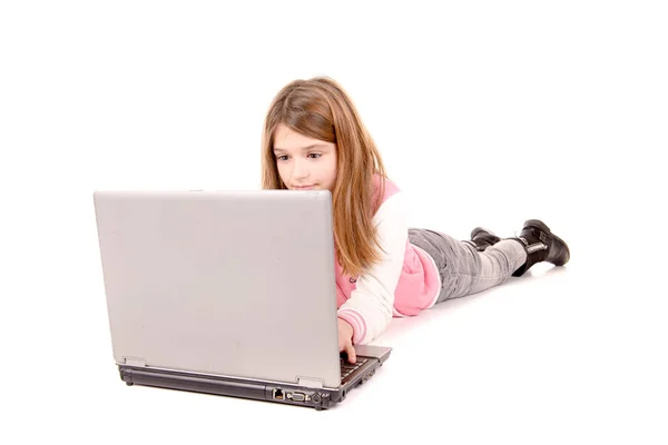 Little girl with computer — Stock Photo, Image