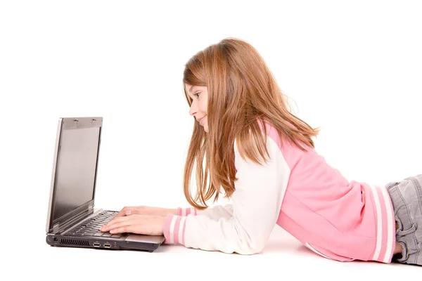 Little girl with computer Stock Picture