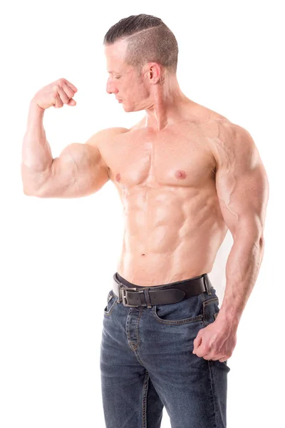 Athlete showing muscles — Stock Photo, Image