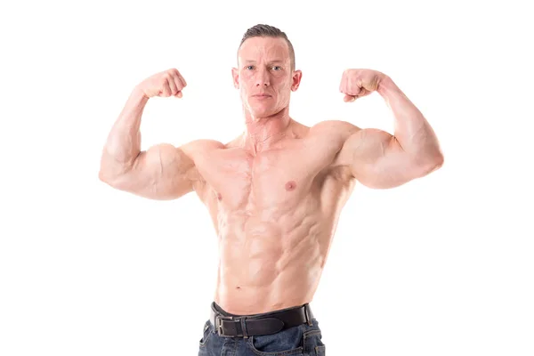 Atleta che mostra muscoli — Foto Stock