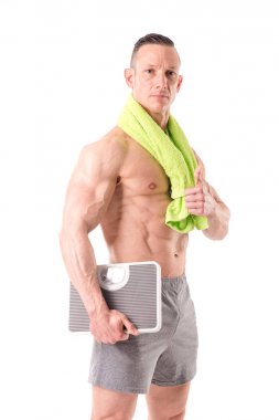 Kaslı adam ölçekler holding